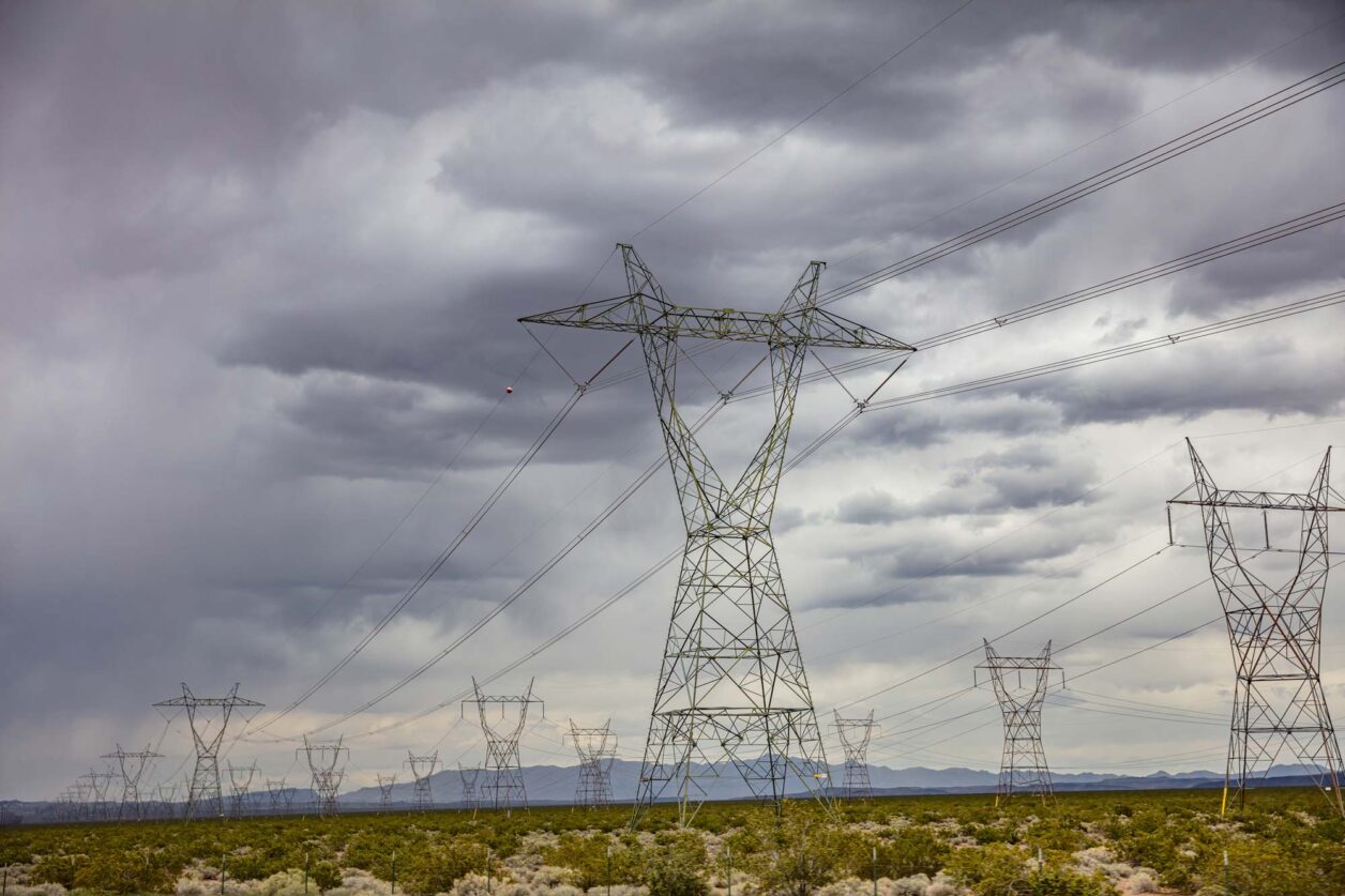 Rural electric power towers transmitting across rural United States